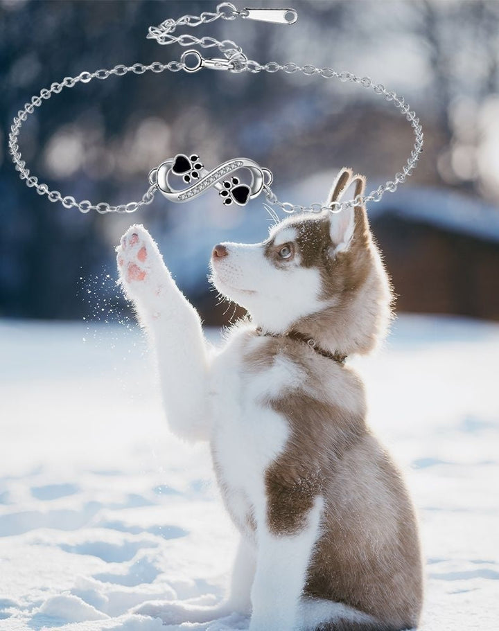 Bransoletka z zawieszką nieskończoności i łapką zwierzaka z cyrkonią