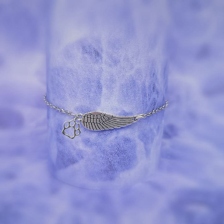 Srebrna bransoletka pamiątkowa z anielskim skrzydłem i odciskiem łapki | ręcznie wykonana