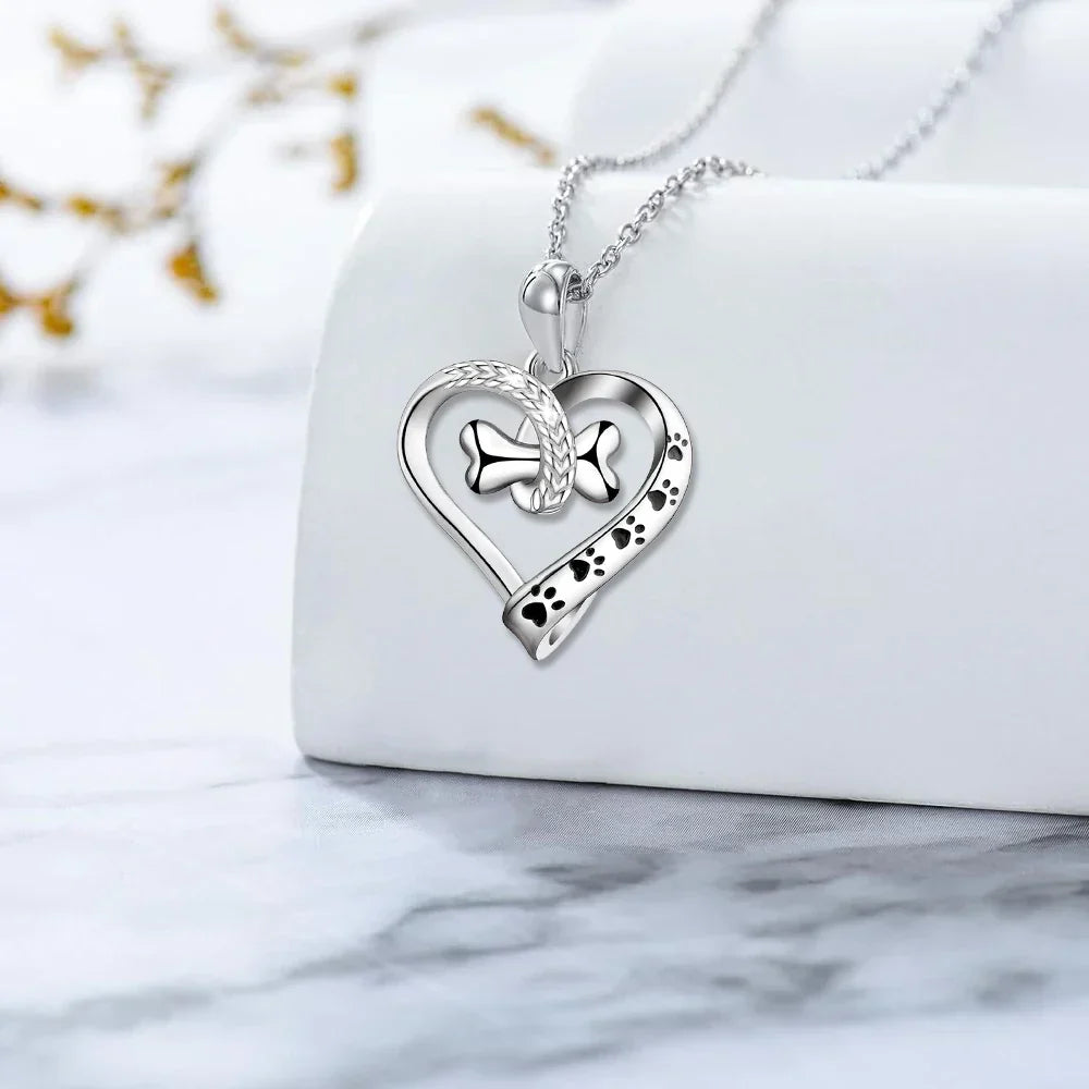 Zestaw biżuterii 2-częściowy z zawieszkami łapki, serca i kostki